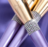 XNO COSMETICS PURPLE BLING BRUSH AND SILVER BAG